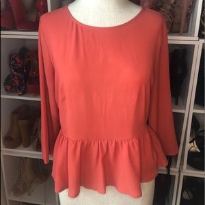 Peplum Top With Rear Zipper Detail